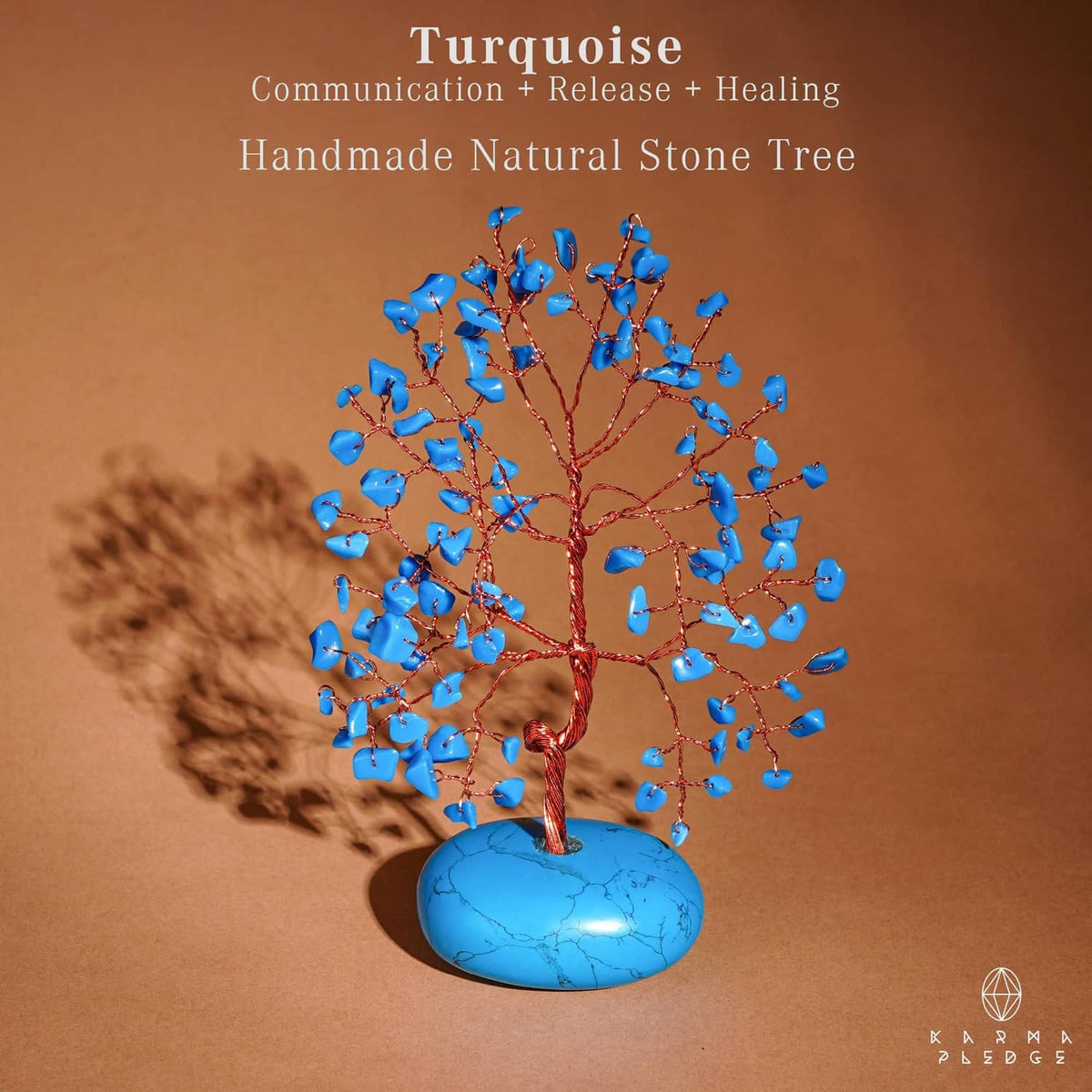 Turquoise crystal tree ornament with blue stone base, red wire trunk and blue chips