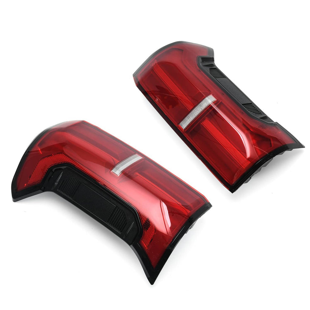 Two red rear LED tail lights with white bar reflector and black housings