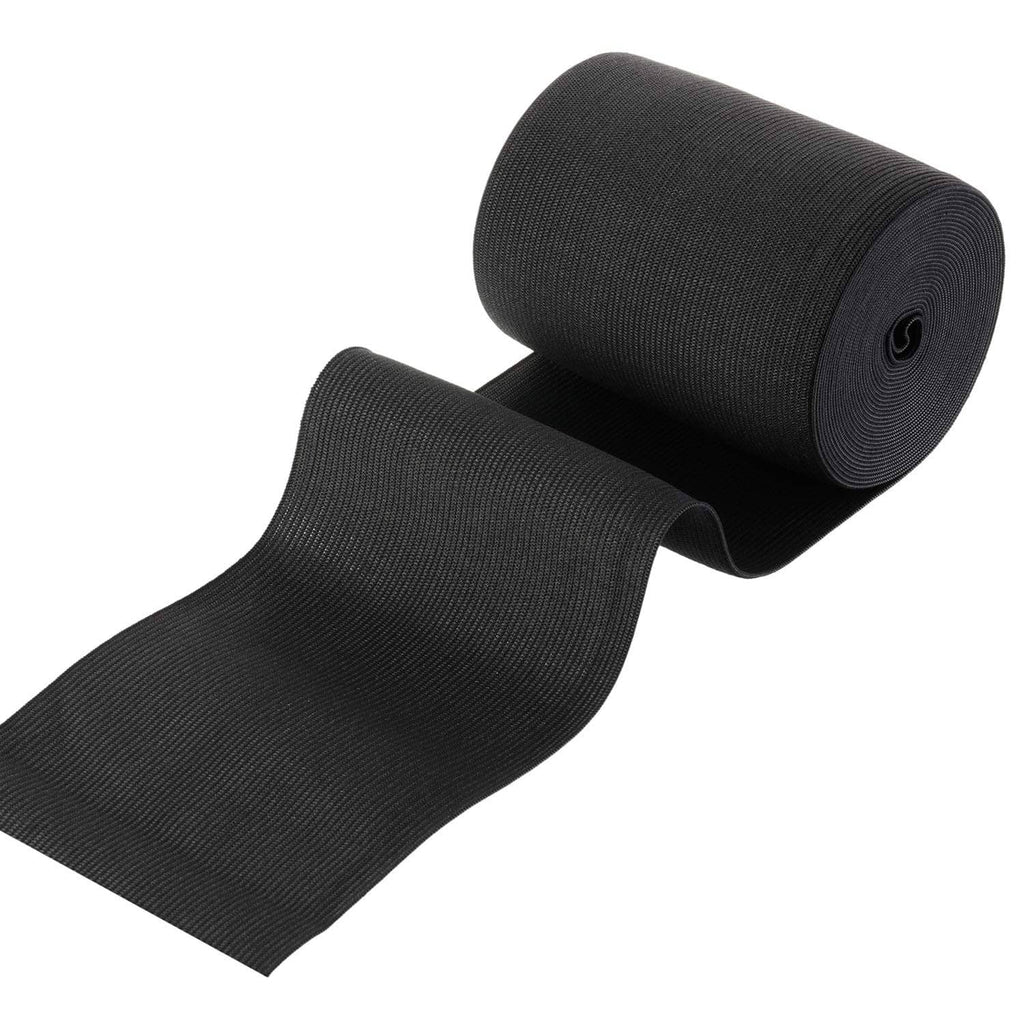 Black elastic tape roll with a length extending outward