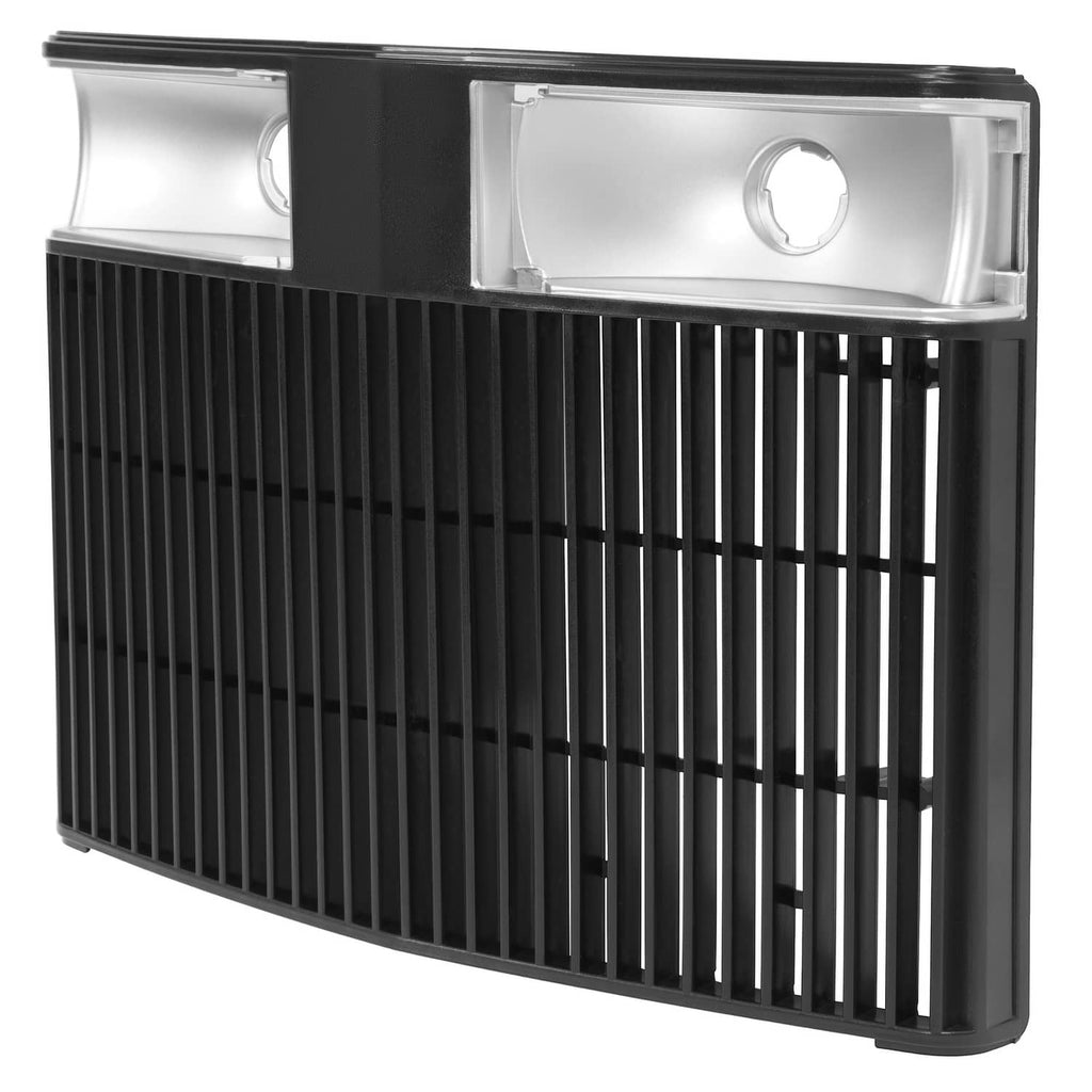 Black tractor grille panel with vertical vents and circular mounting opening