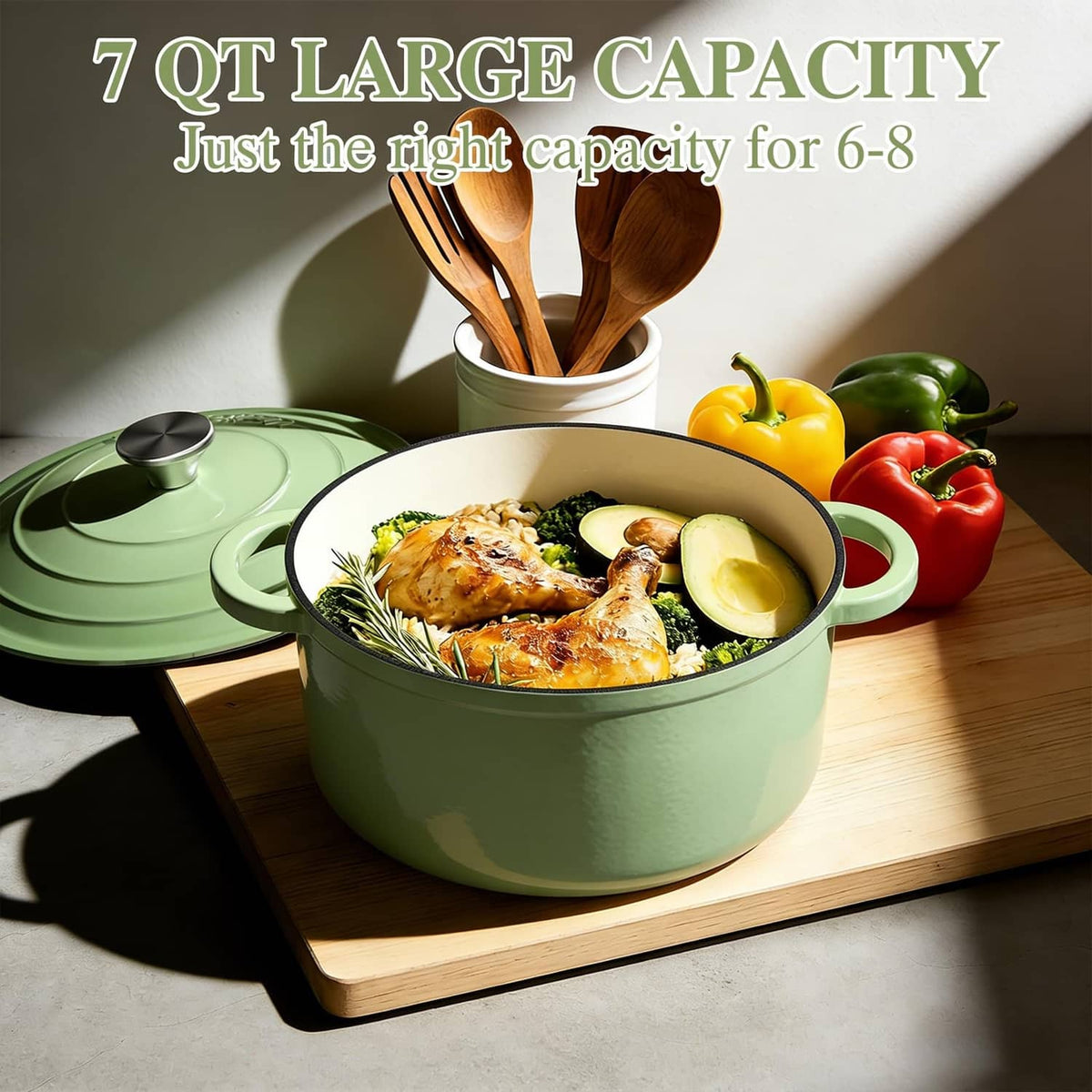 Sage green enameled cast iron Dutch oven with lid and handles, filled with chicken