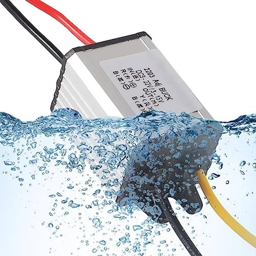 Waterproof DC buck converter module with wires, shown above splash water droplets