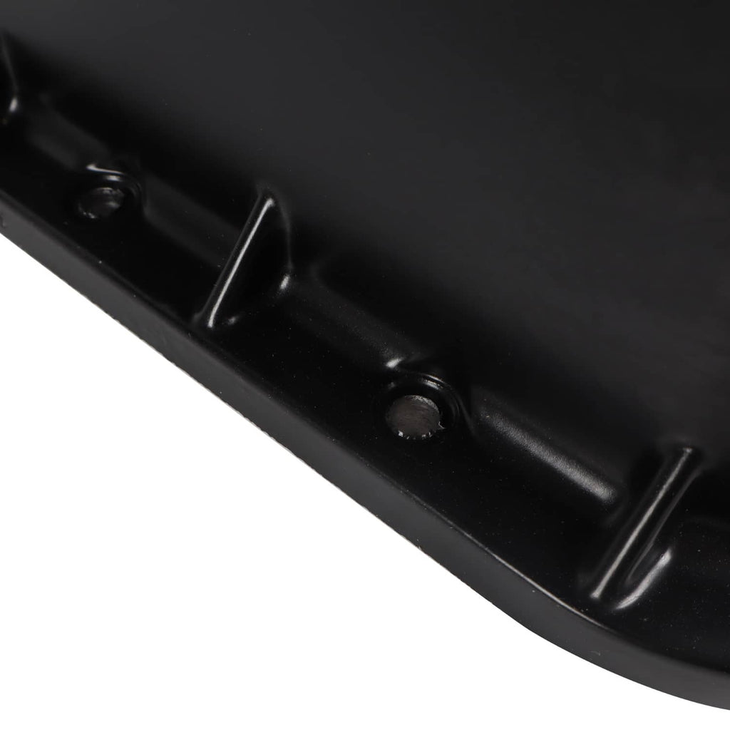 Oil pan edge with black mounting tabs and bolt holes