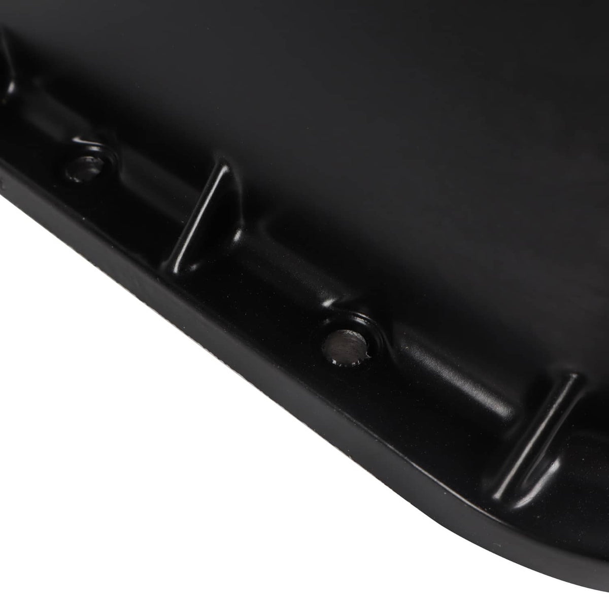 Oil pan edge with black mounting tabs and bolt holes