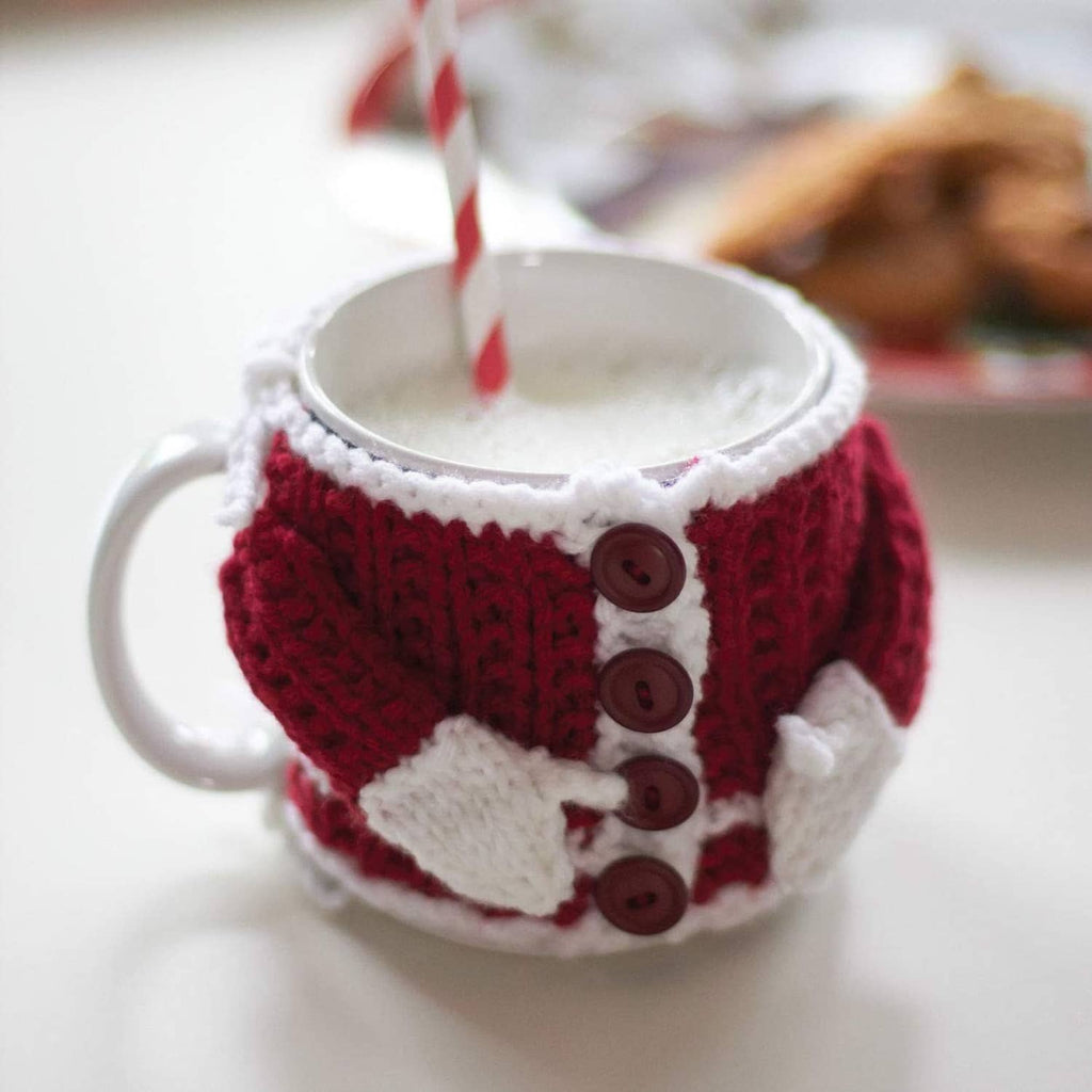 Knitted mug cozy with red and white striped design and dark buttons