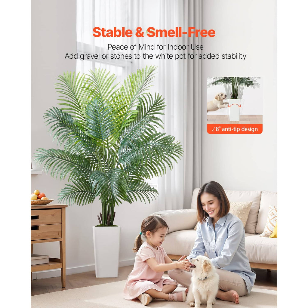 Artificial areca palm tree in a white pot with dense green leaves and a realistic look