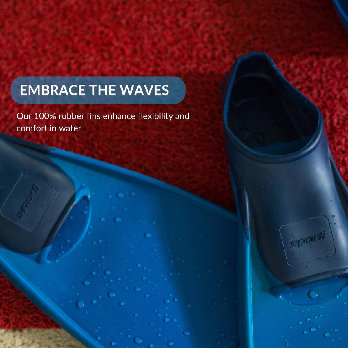 Blue rubber swim fins with closed ankle opening and molded foot pocket