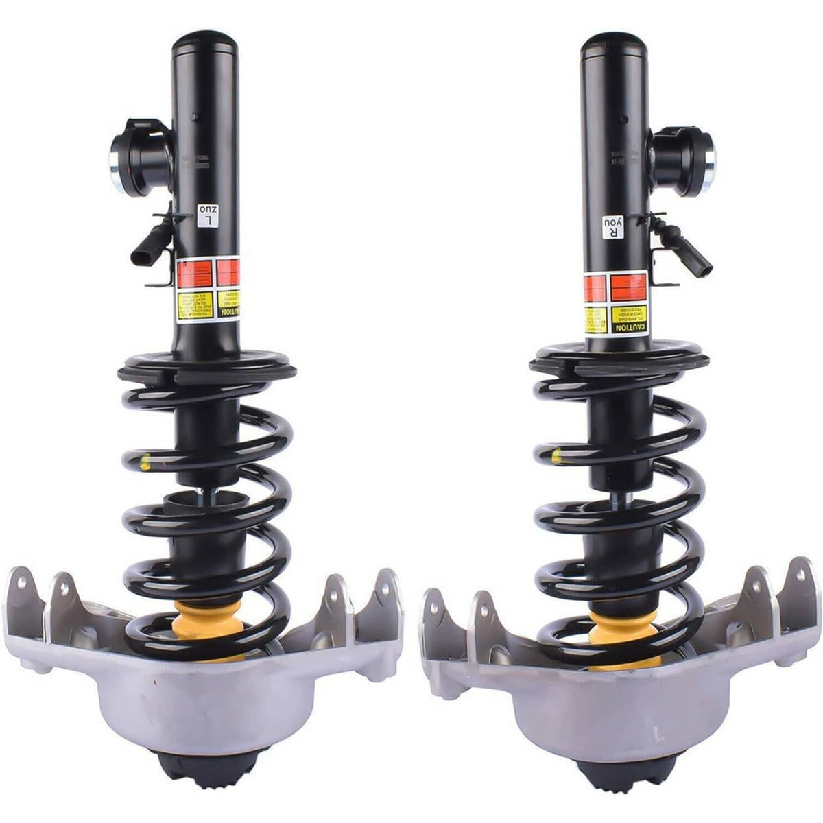Pair of front shock struts with black cylinders, coil springs, and mounting brackets