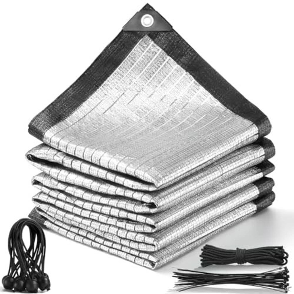 Silver shade cloth stacked with black border, grommets, ropes, and zip-ties