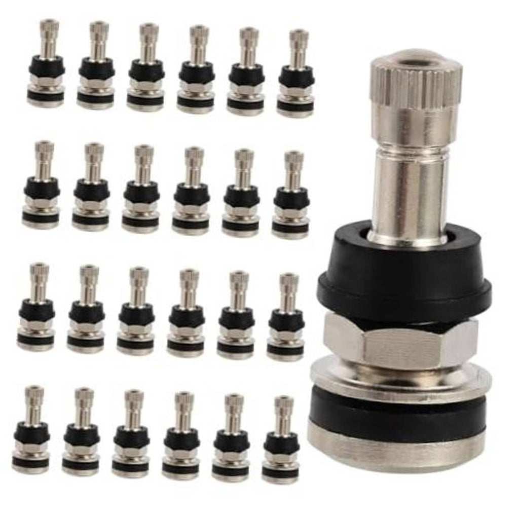Set of brass tire valve stems with black rubber bases, multiple valve caps included
