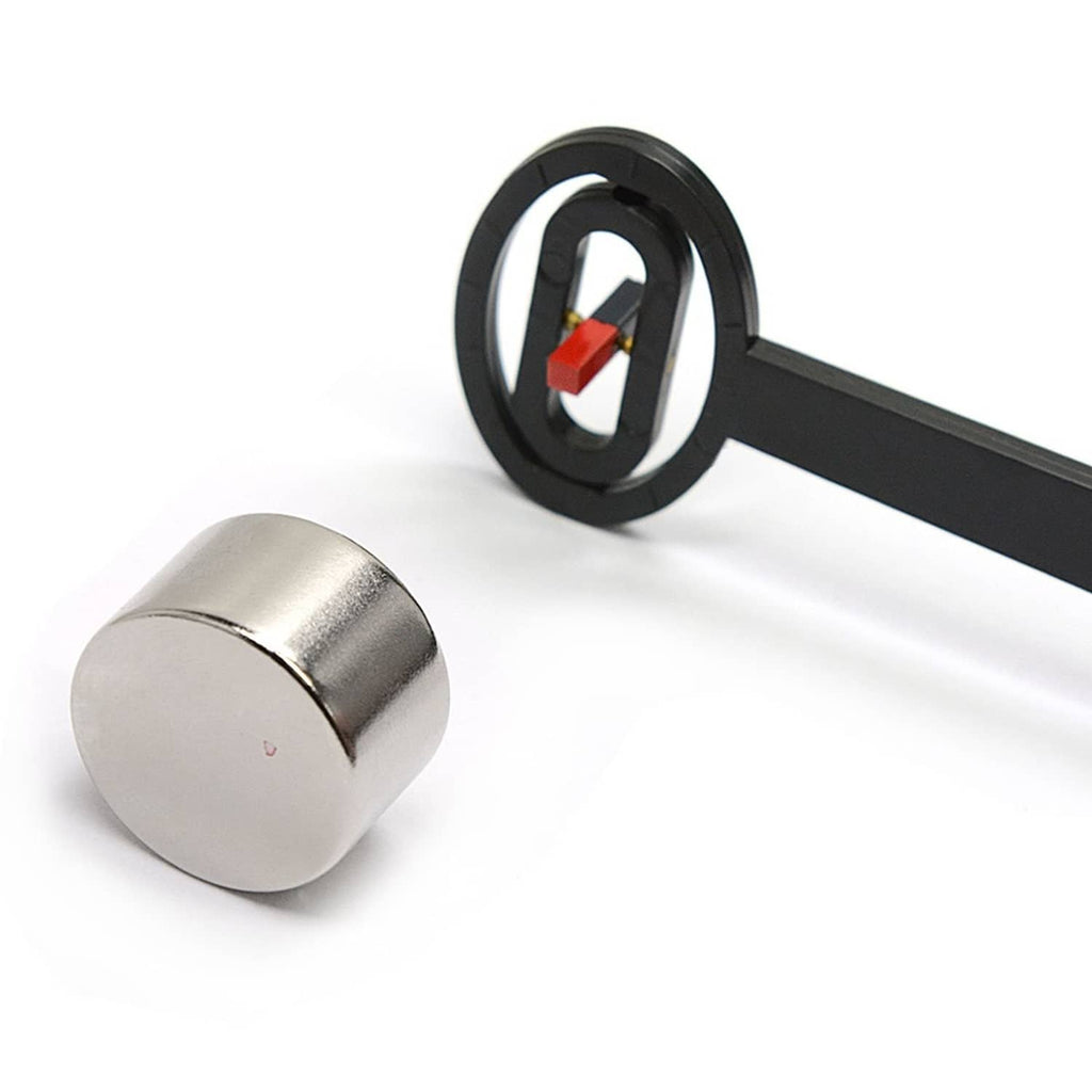 Magnetic pole detector ring head near round metal magnet