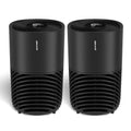 Two black air purifiers, stacked vented cylinders with top fan grille