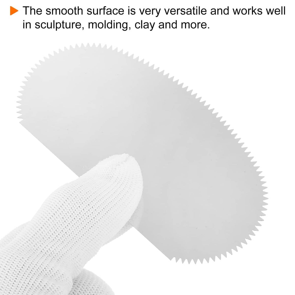 Stainless steel clay scraper with smooth face and serrated edge; used for shaping clay
