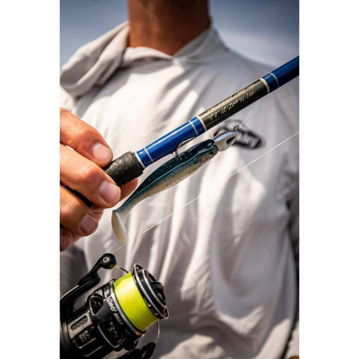 Swimbait minnow lure on the fishing line near the rod tip