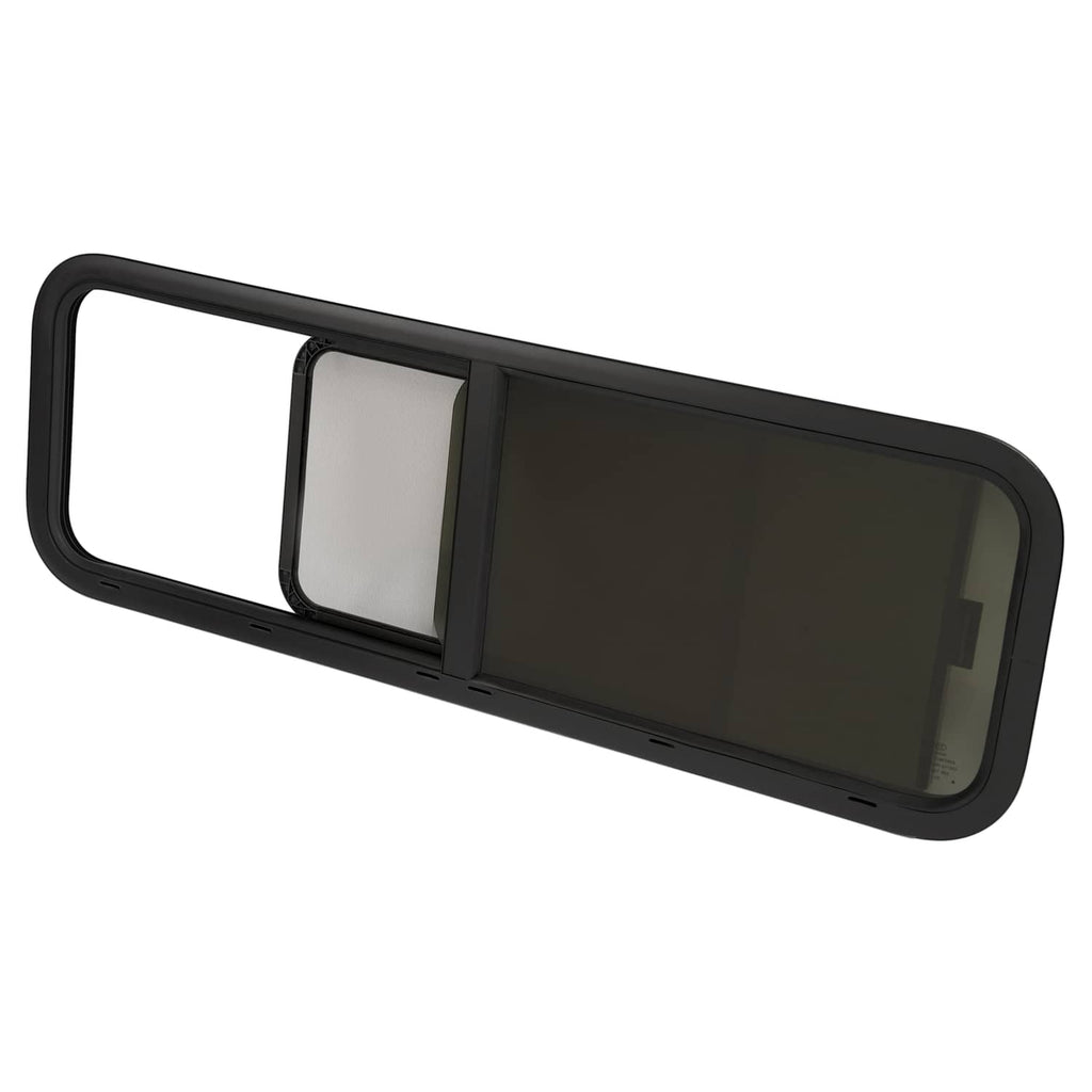Horizontal sliding RV window with dark trim, tinted glass panel and light inner panel.