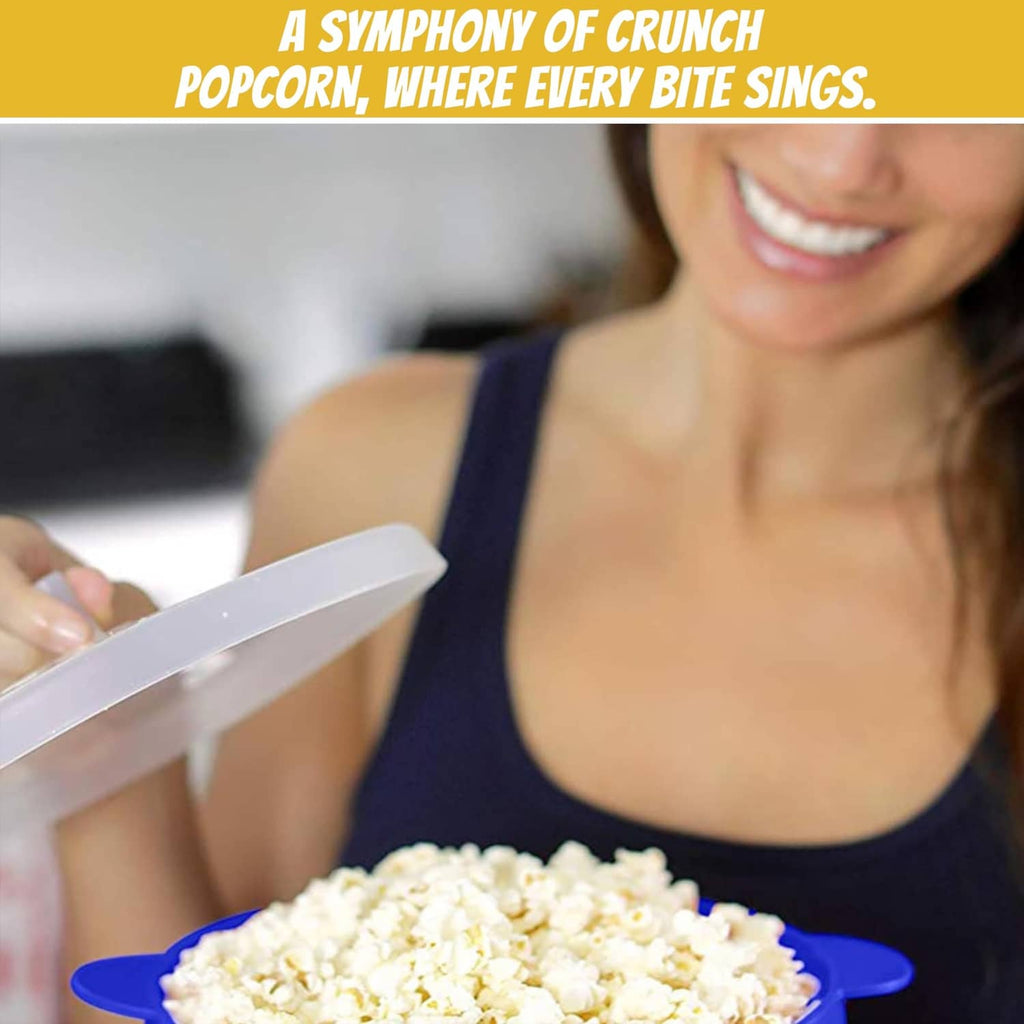 Person holding a bowl of popped popcorn beside a striped paper cup