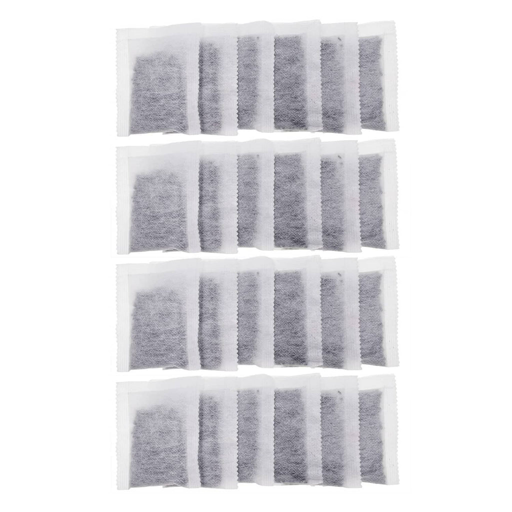 Activated charcoal distiller replacement pads, white sachets with grey charcoal pieces