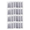 Activated charcoal distiller replacement pads, white sachets with grey charcoal pieces