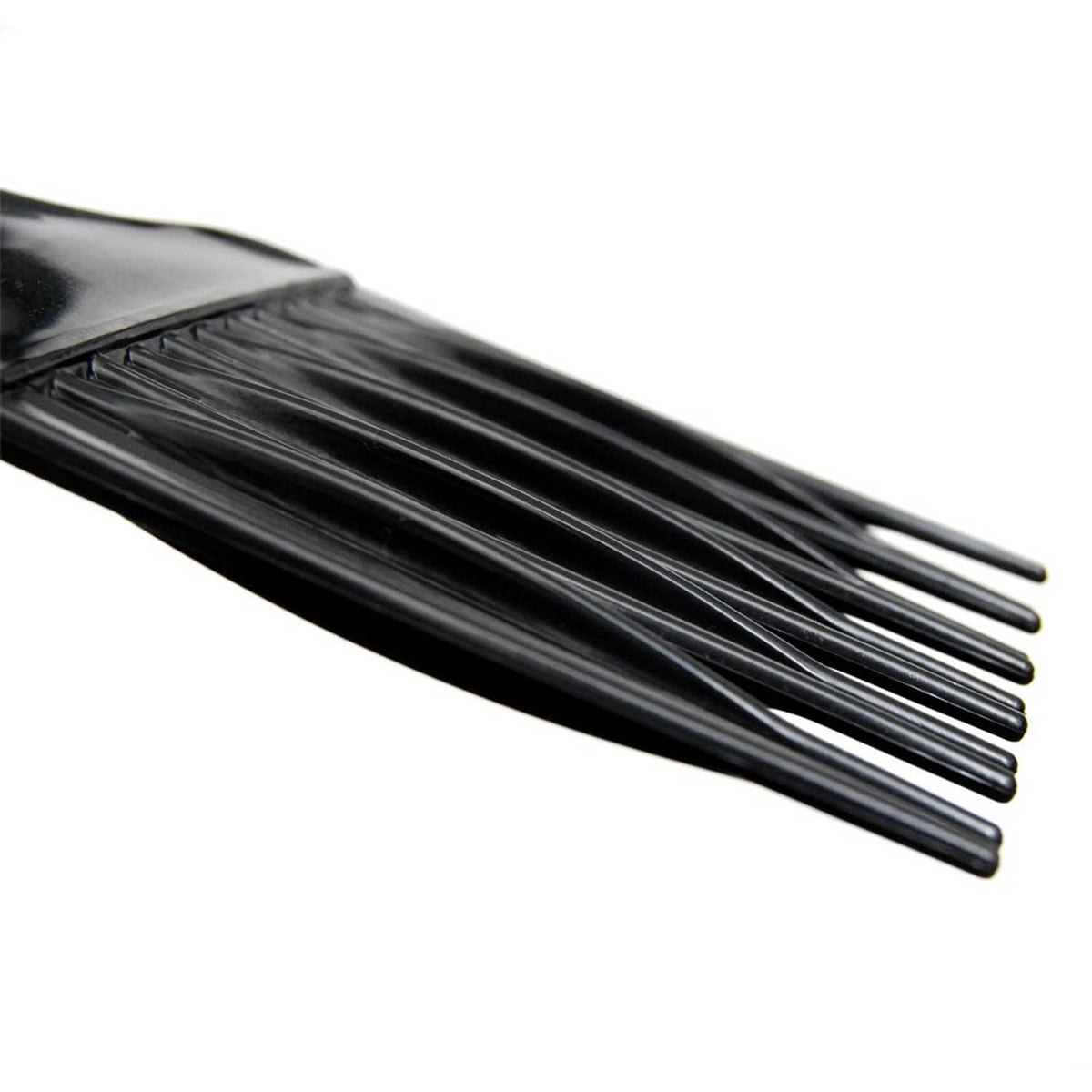 Close-up of black wide-tooth hair comb with fine rounded tips