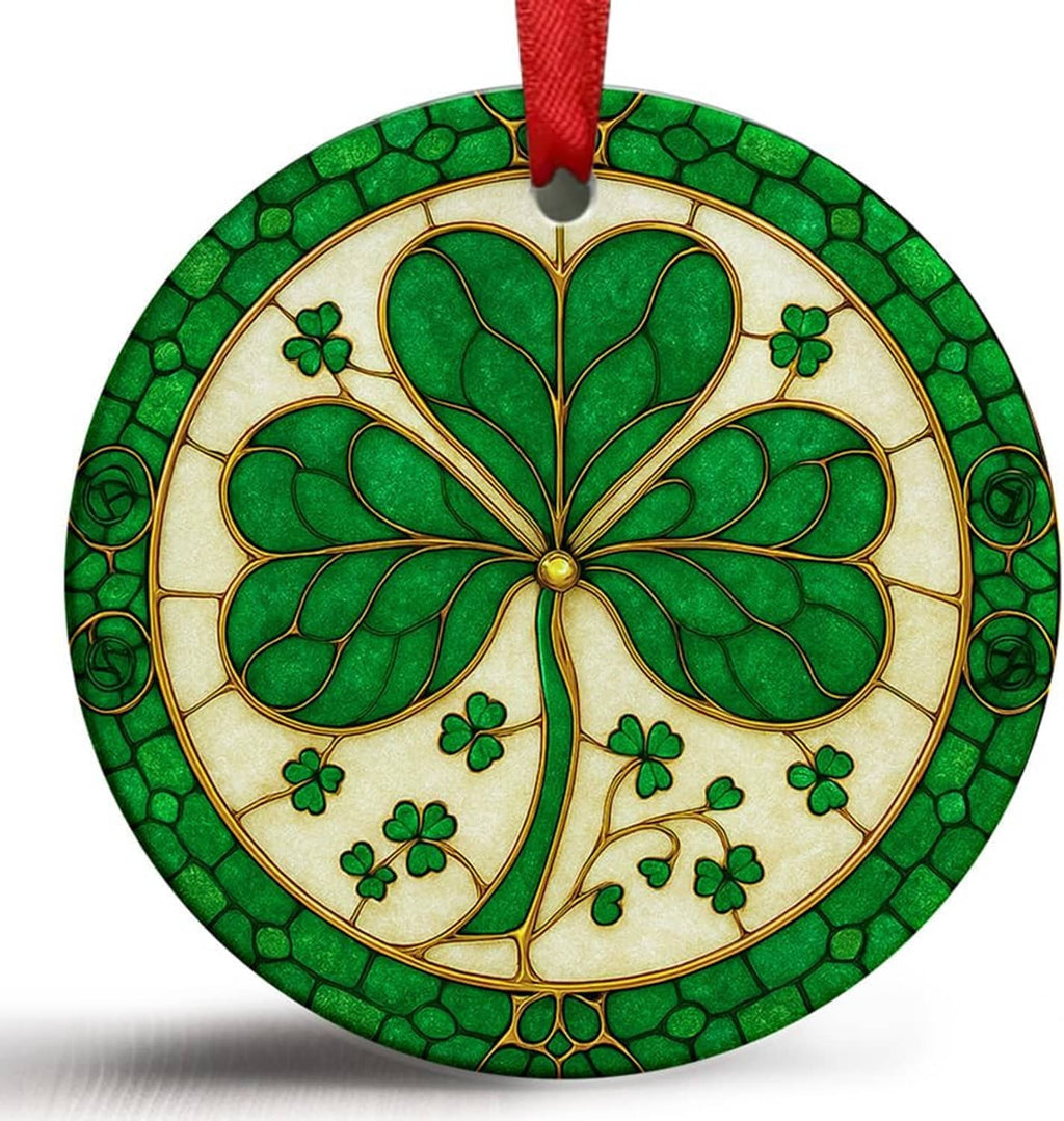 Round ceramic shamrock ornament, green mosaic-style clovers, red ribbon loop at top