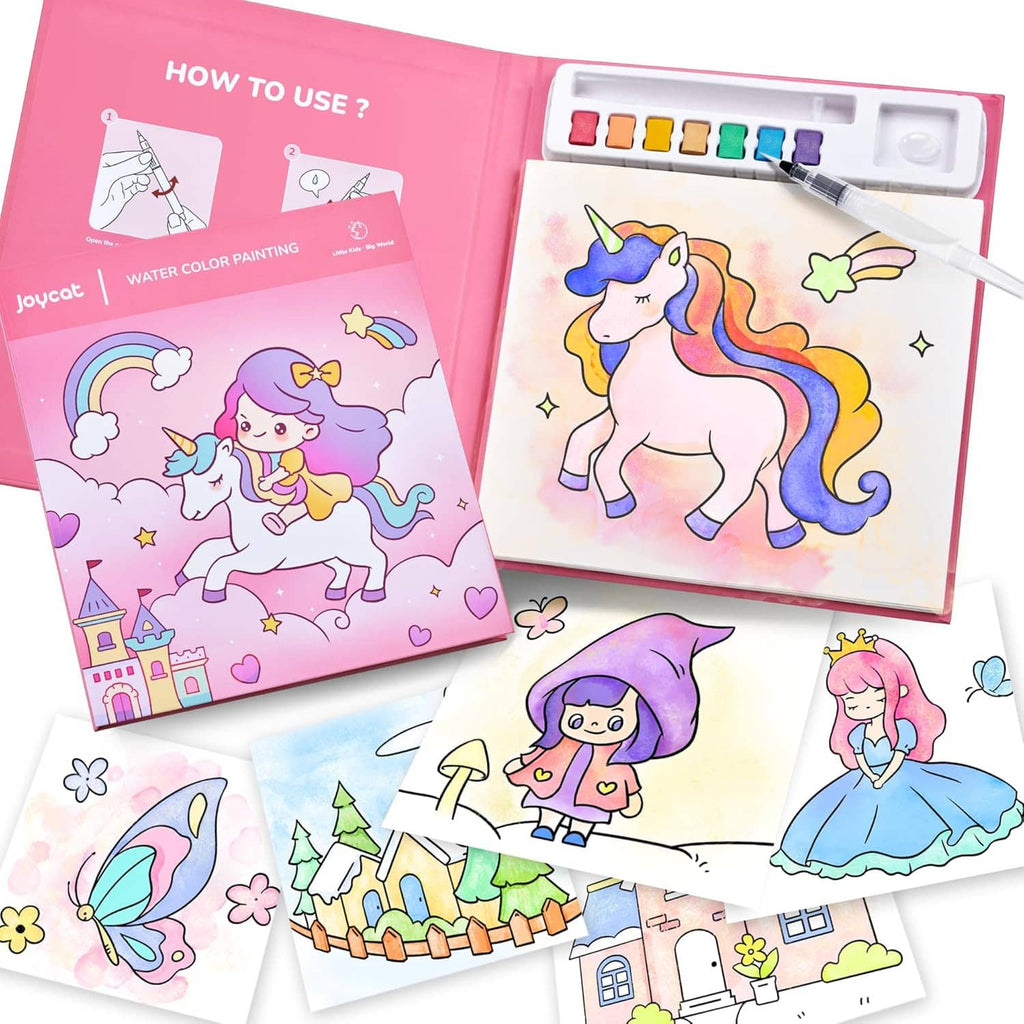 Opened watercolor painting kit box with instruction pages, unicorn painting, and sample cards
