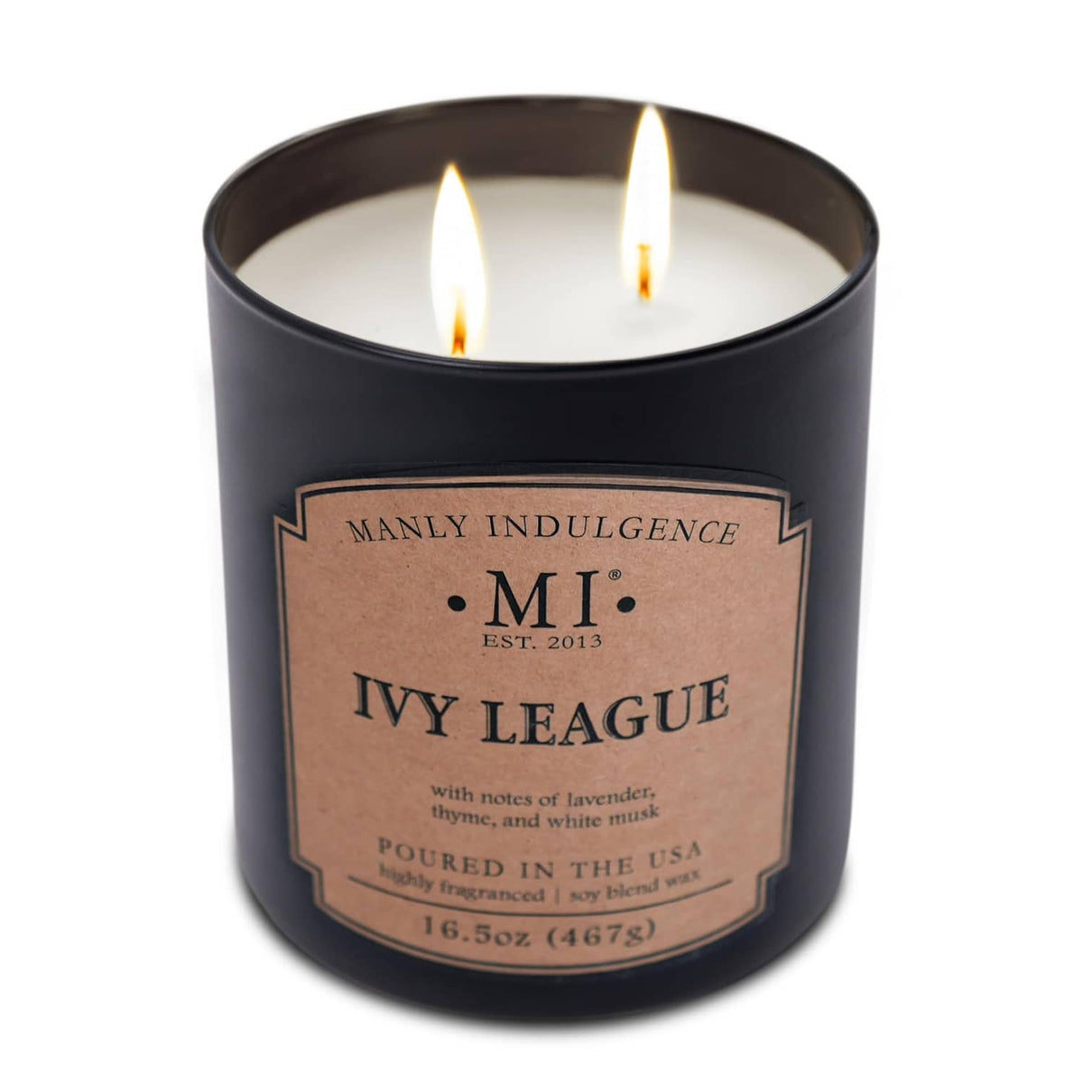 Lit black scented candle jar with warm flames and kraft 'Ivy League' label