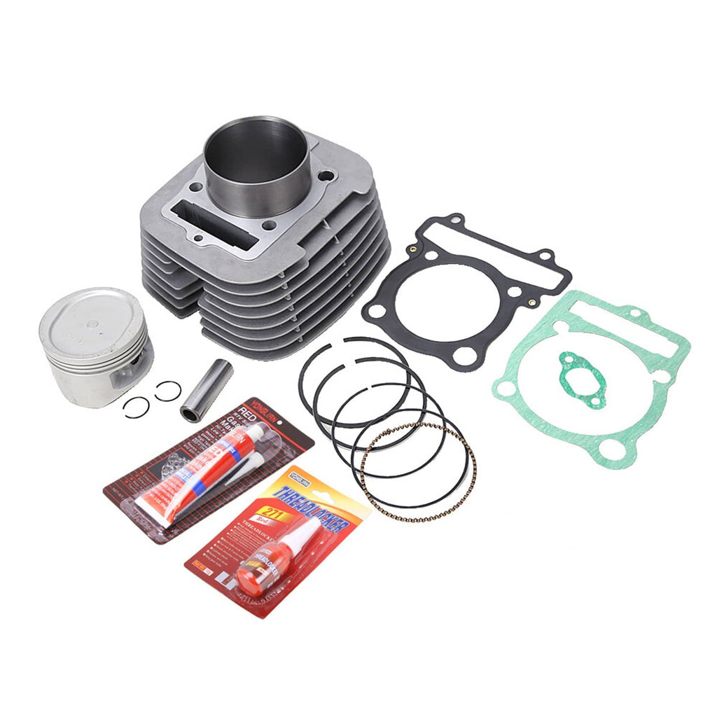 ATV cylinder piston rebuild kit showing cylinder block, gaskets, rings, and piston