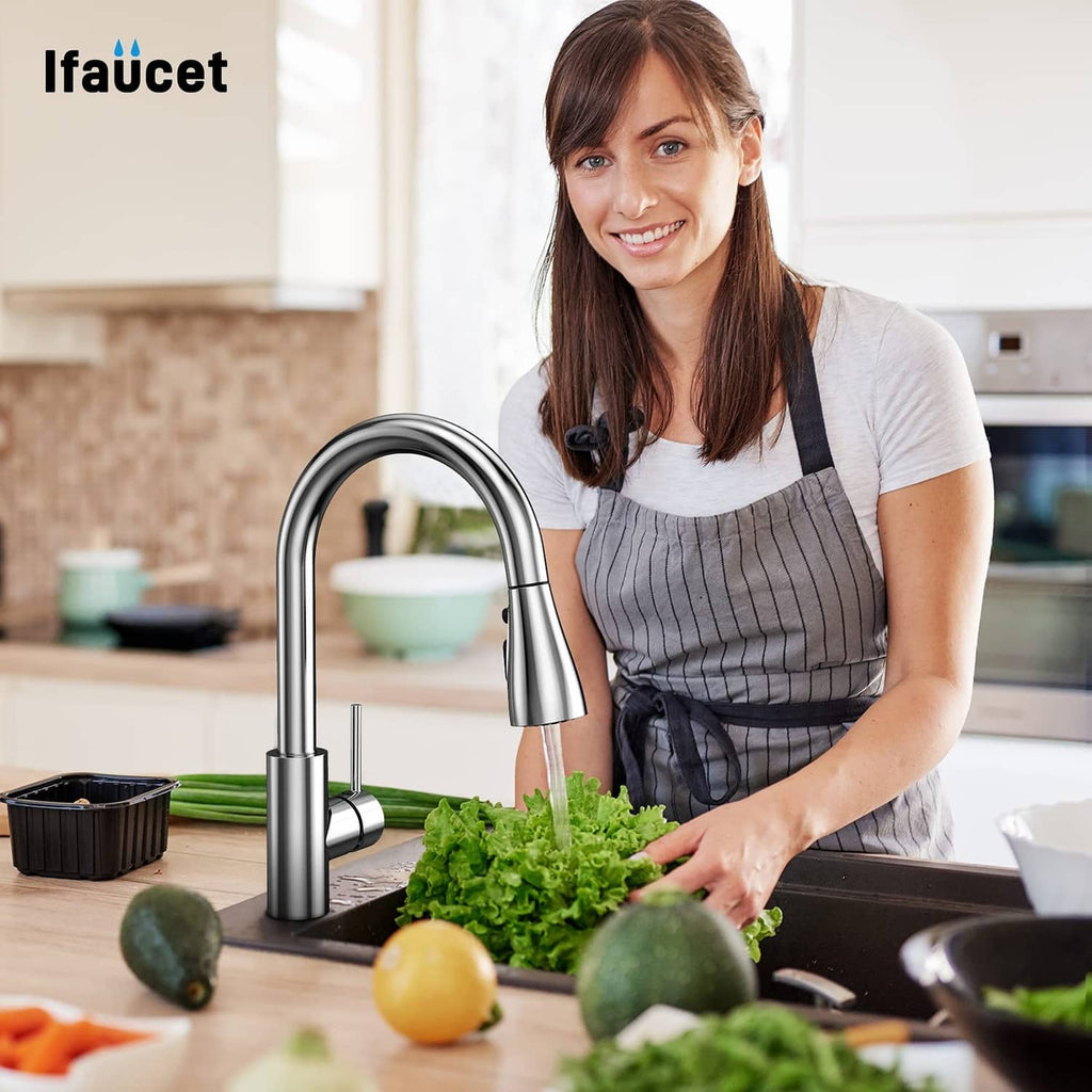 Chrome kitchen faucet with attached spray head replacement nozzle