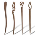 Set of 4 brown wooden hair sticks with carved swirl tips