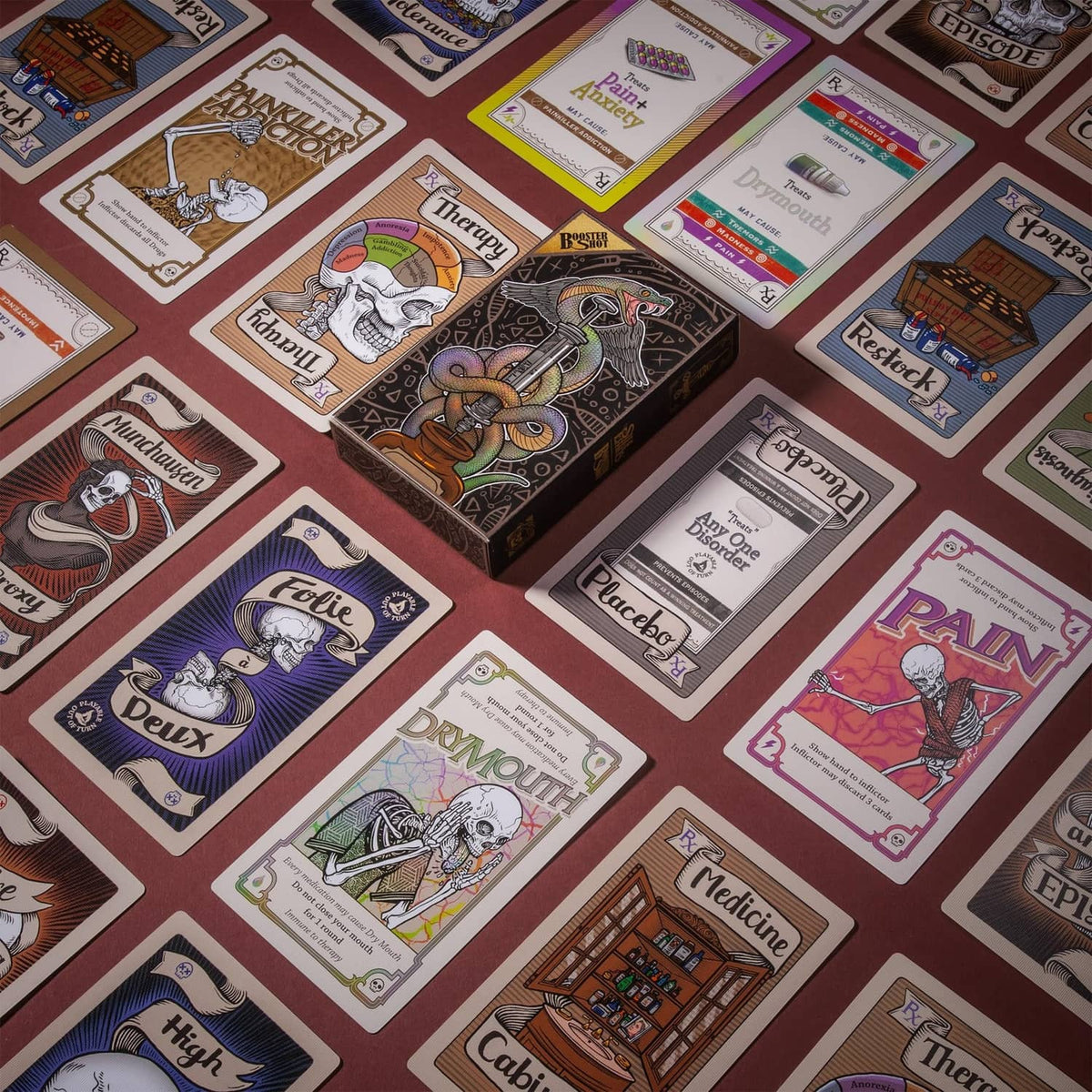 Side Effects card deck spread with illustrated condition cards in bordered sleeves