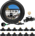 Outdoor misting system hose kit with black tubing, brass nozzles, and green adapters