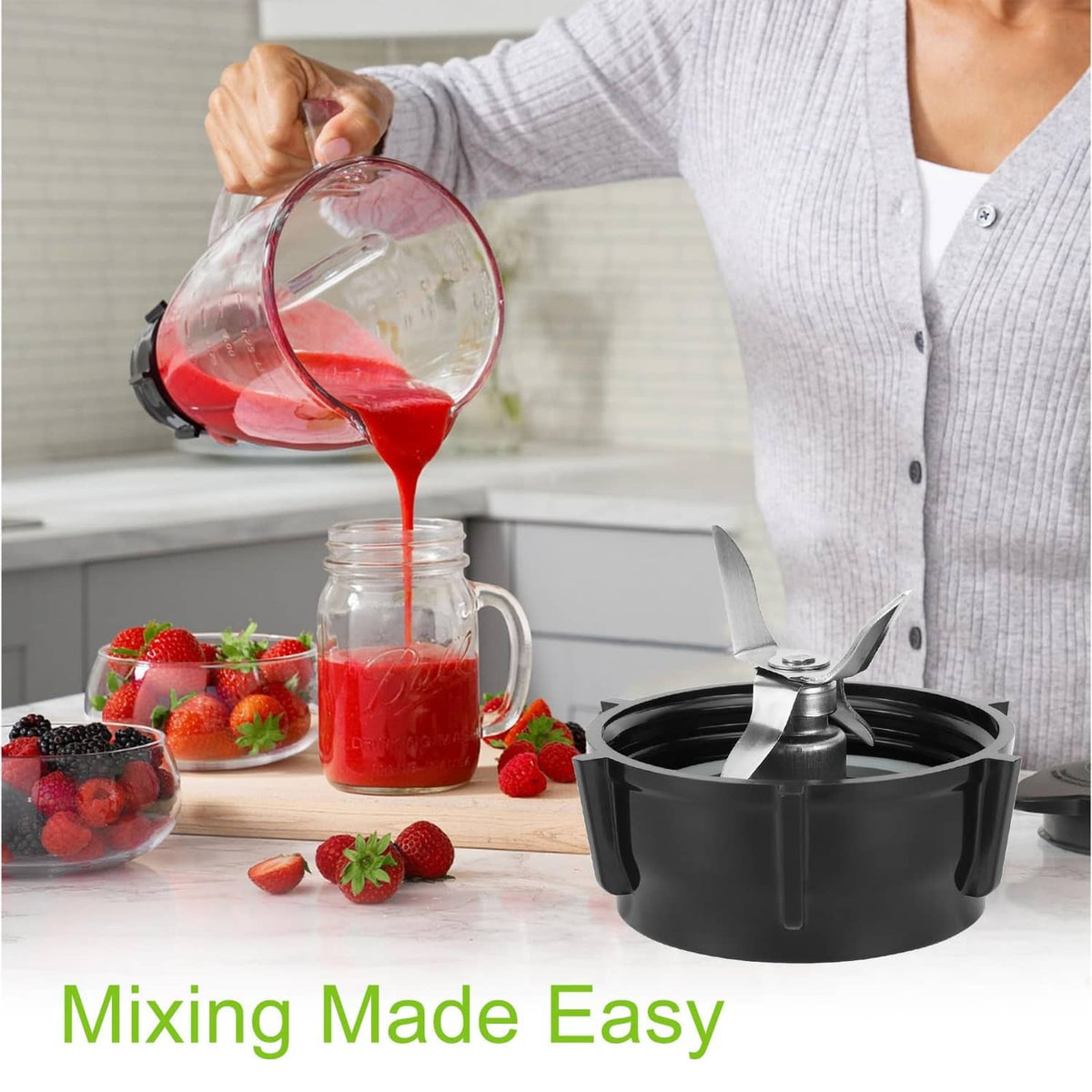 Blender jar with blade base and pouring smoothie for mixing