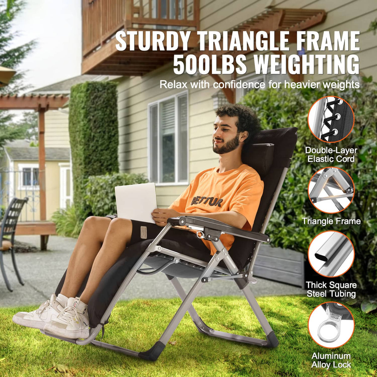 Black zero-gravity recliner chair with headrest and side tray on silver frame