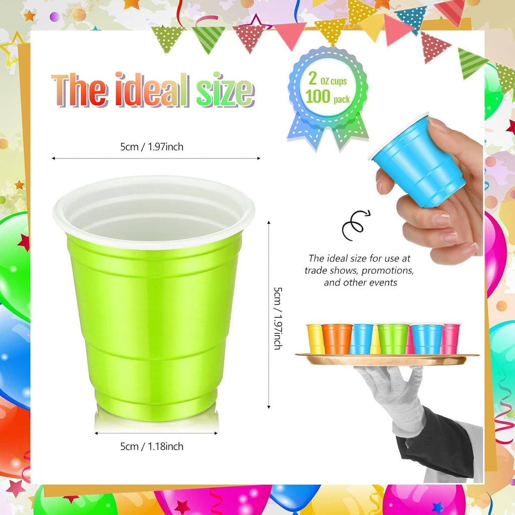 Green 2 oz disposable plastic shot cup with size view, from a 100-pack