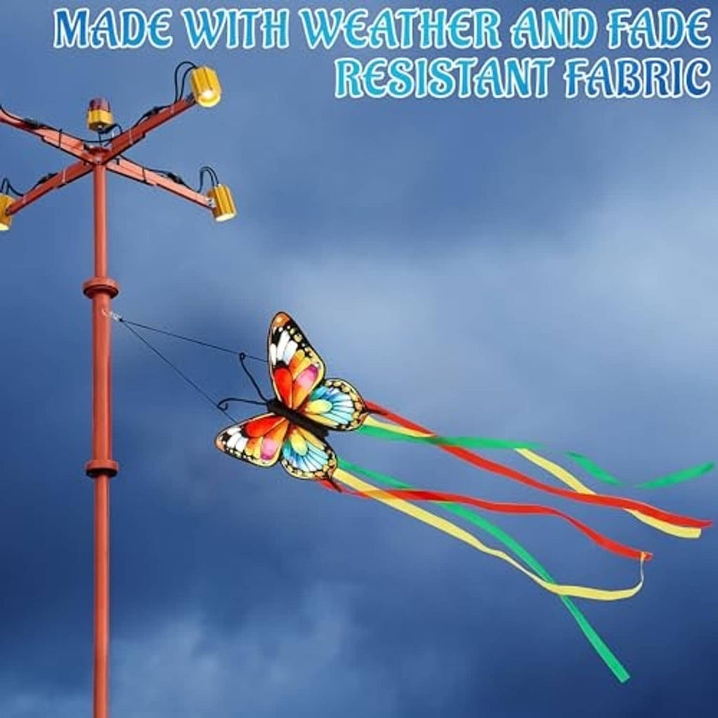 Butterfly windsock on orange pole with long rainbow ribbon streamers