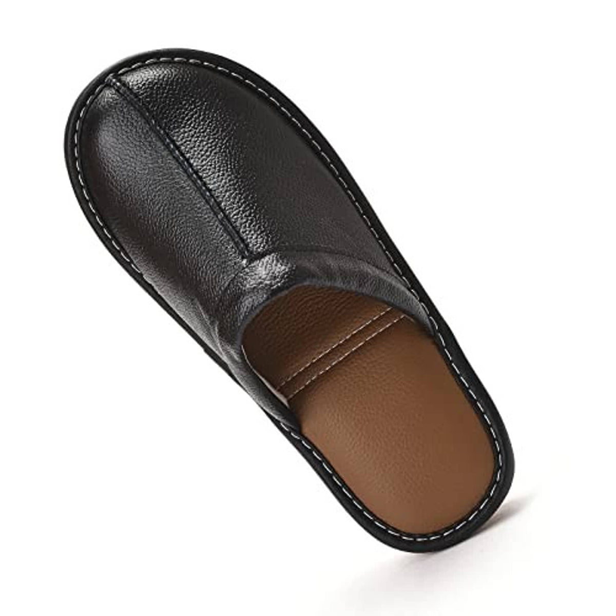 Black leather slip-on slipper angled view with stitched trim and tan footbed