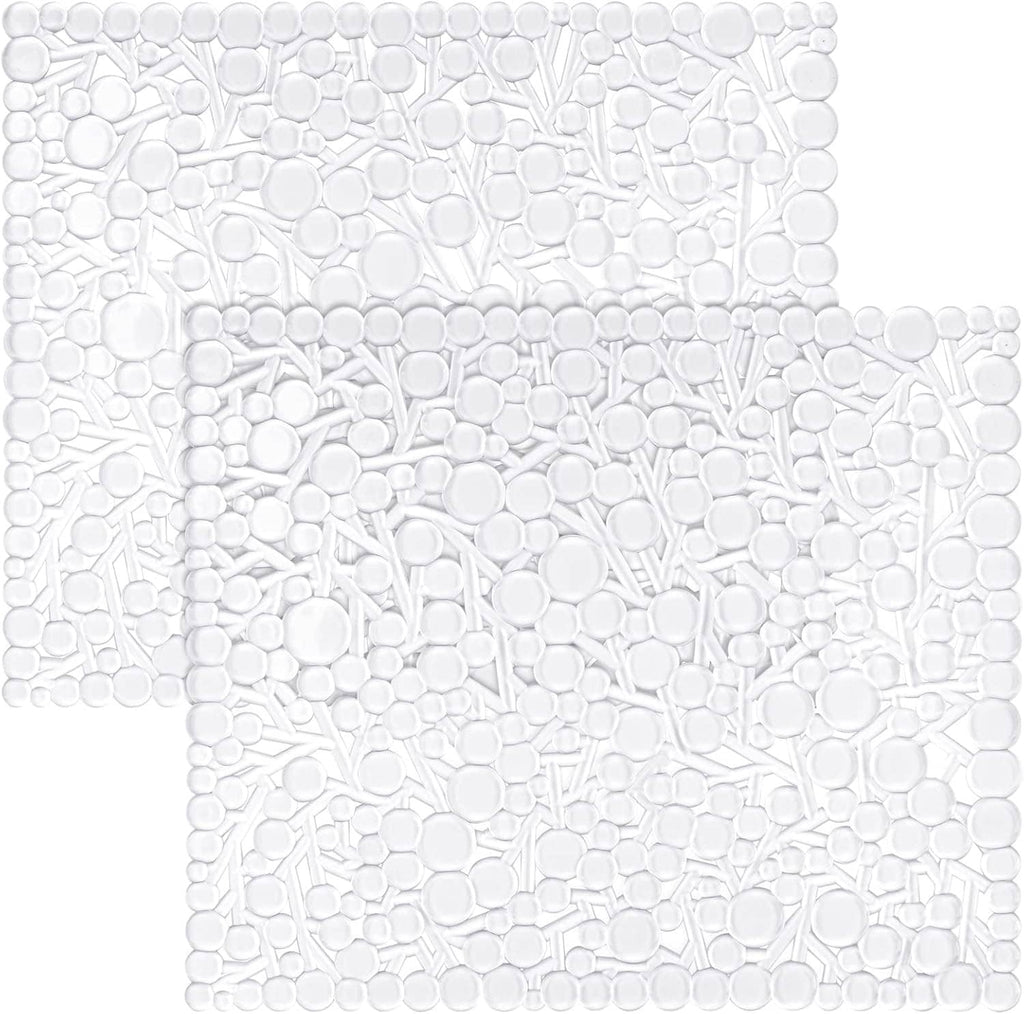 Square white PVC sink mat with raised bubble texture and branch-like embossed pattern