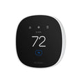 White smart thermostat with dark screen showing 72°