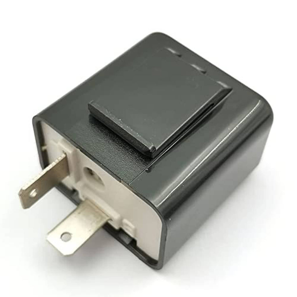 Motorcycle indicator flasher relay with dark gray body and side mounting tabs