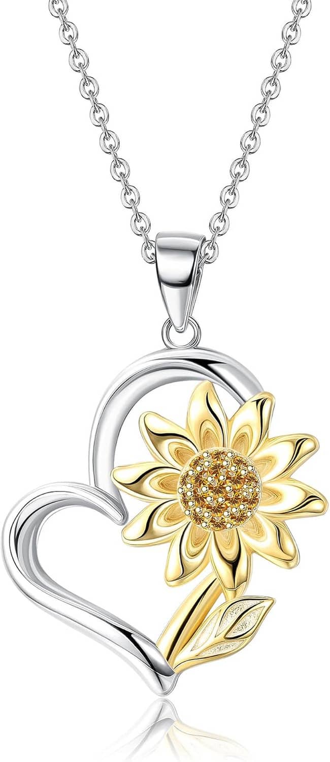 Silver chain necklace with gold-plated sunflower heart pendant and faceted center detail.
