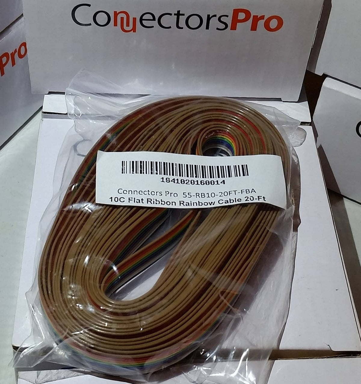 Rainbow flat ribbon IDC connector cable on coil in clear plastic bag with label