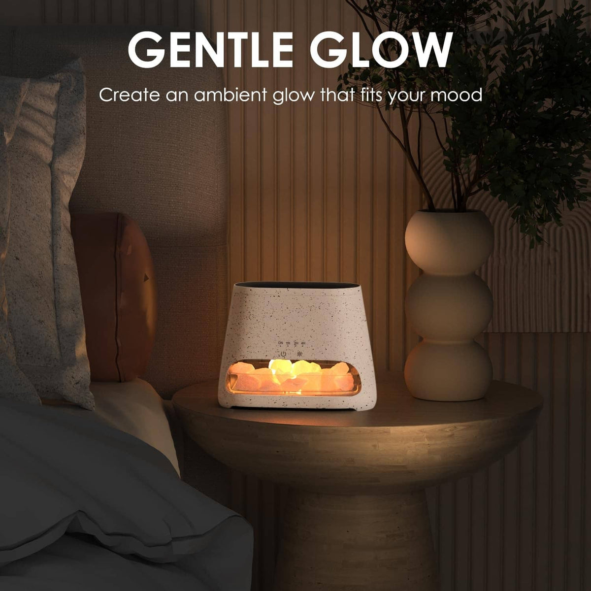 Off-white speckled salt lamp diffuser on side table with gentle warm glow