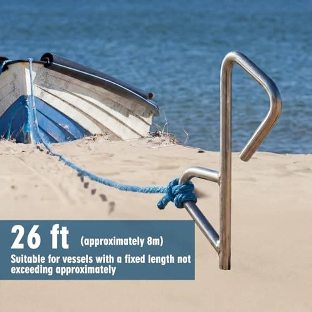 Chrome sand spike boat anchor with chain and rope, near a beached small boat