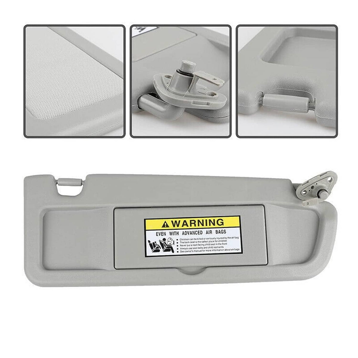 Light gray sun visor with warning label and corner mounting bracket