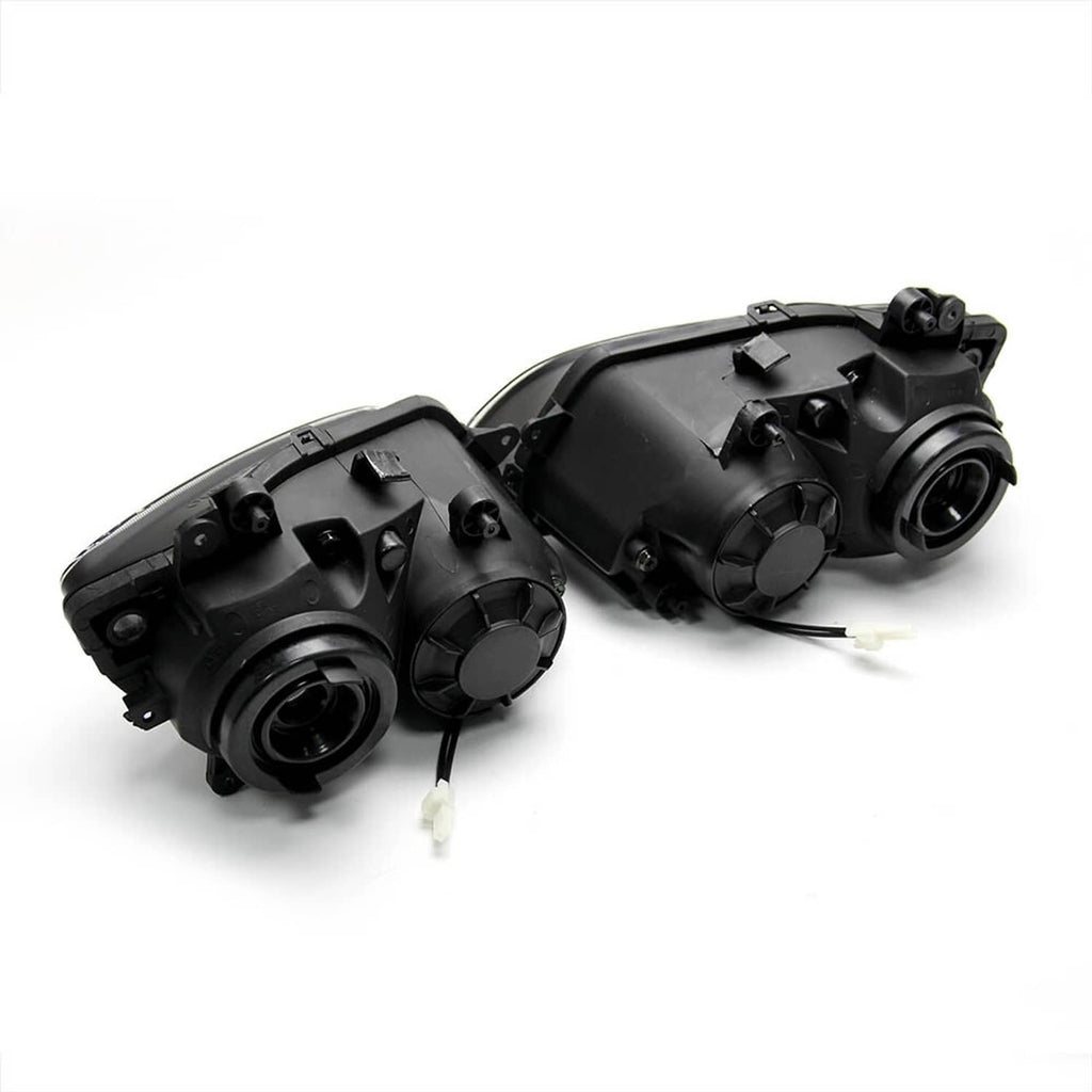 Rear view of dual headlight assemblies with wiring connectors