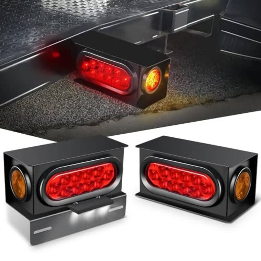 Set of two black tail light boxes with red oval lenses and amber side markers