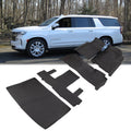 Black rubber floor mat set and cargo liner with ridged channels and raised edges