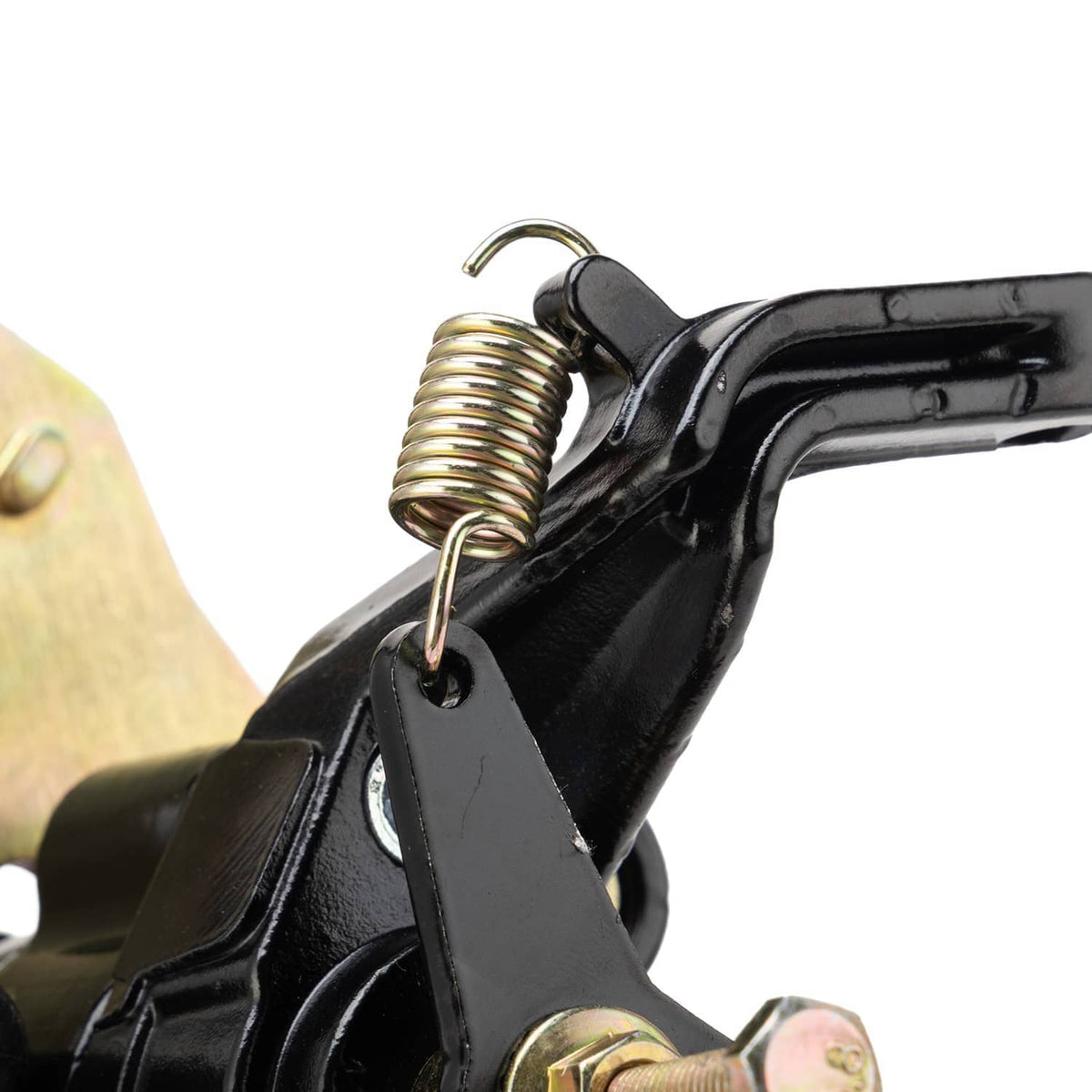 Close-up of rear brake caliper spring and black linkage with mounting bolt