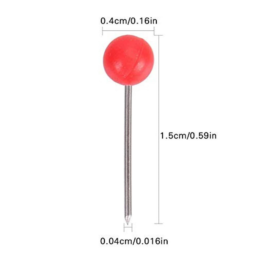 Close-up of a red map push pin with a round plastic head on a metal pin