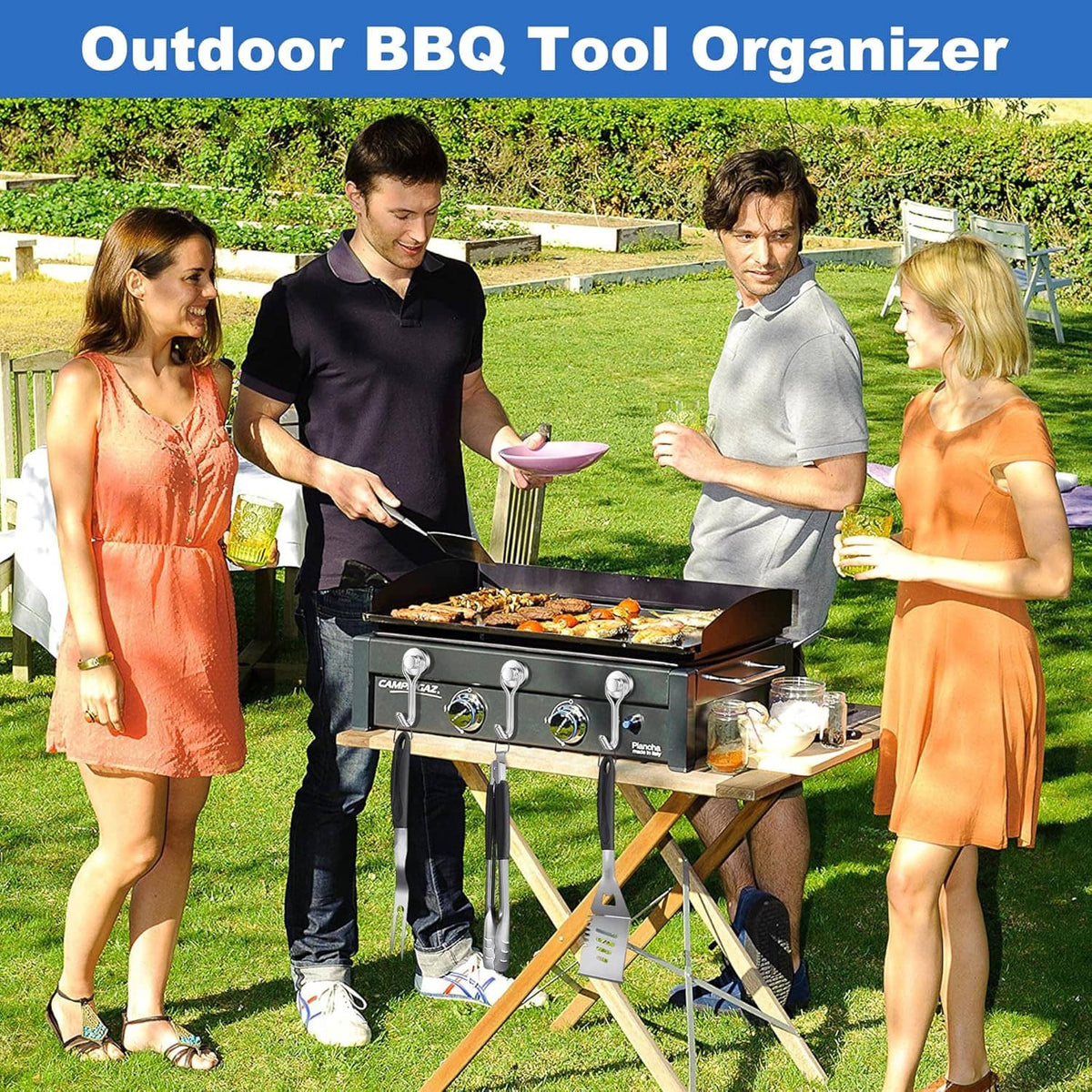 Outdoor BBQ tool organizer with silver magnetic hooks on a hanging bar
